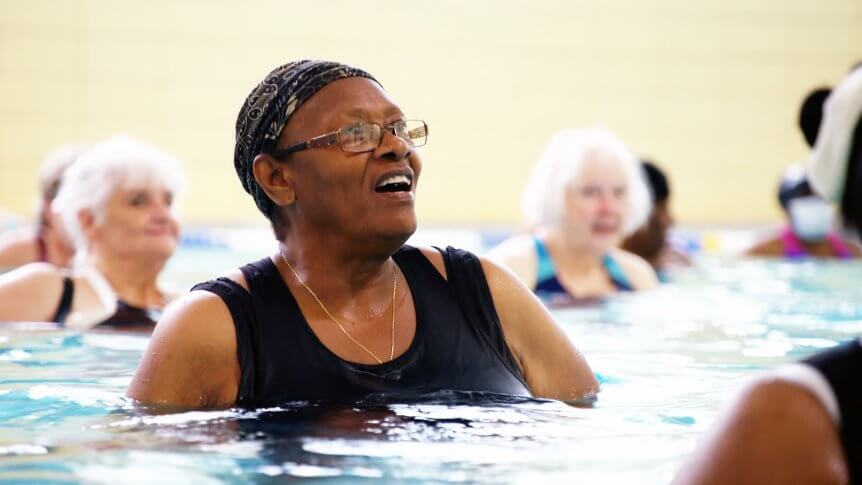 Senior citizens enjoy water aerobics at a local YMCA.